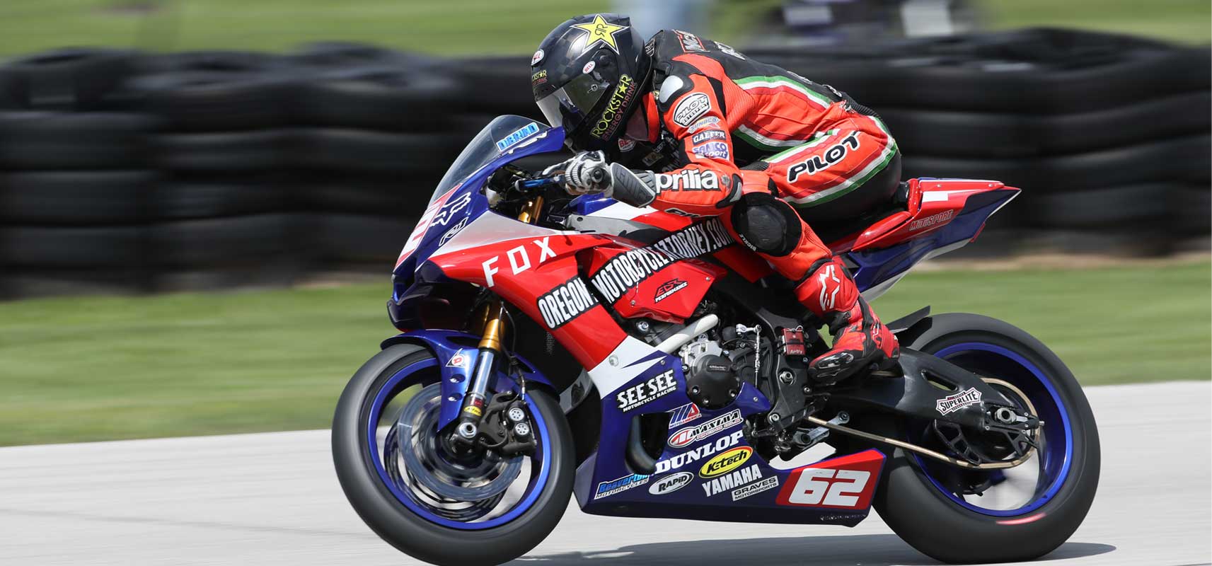 Andy DiBrino riding tight and aerostreamed ripping down the track MotoAmerica Wisconsin on his EDR Performance R1 - maybe a little wheelie but we'll have to ask Andy.