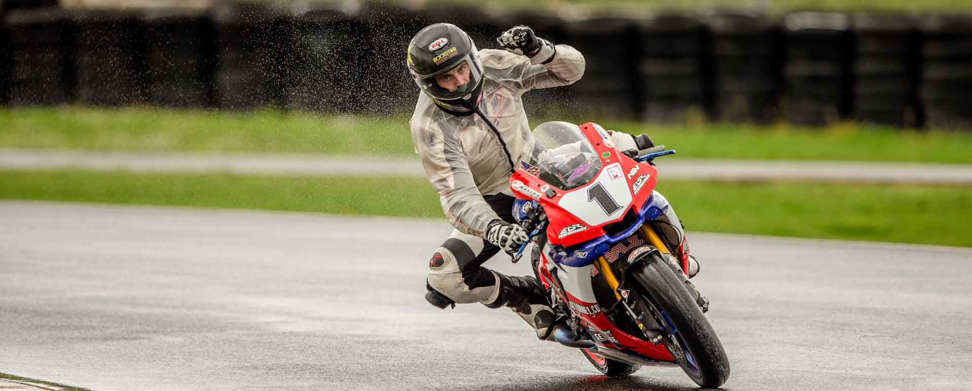 Andy after a win in wet contditions racing his R1 1000cc motorcycle at Portland International Raceway OMRRA round 1 series