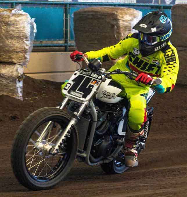 On the gas charging on the Harley Hooligan bike on his way to a heat win.