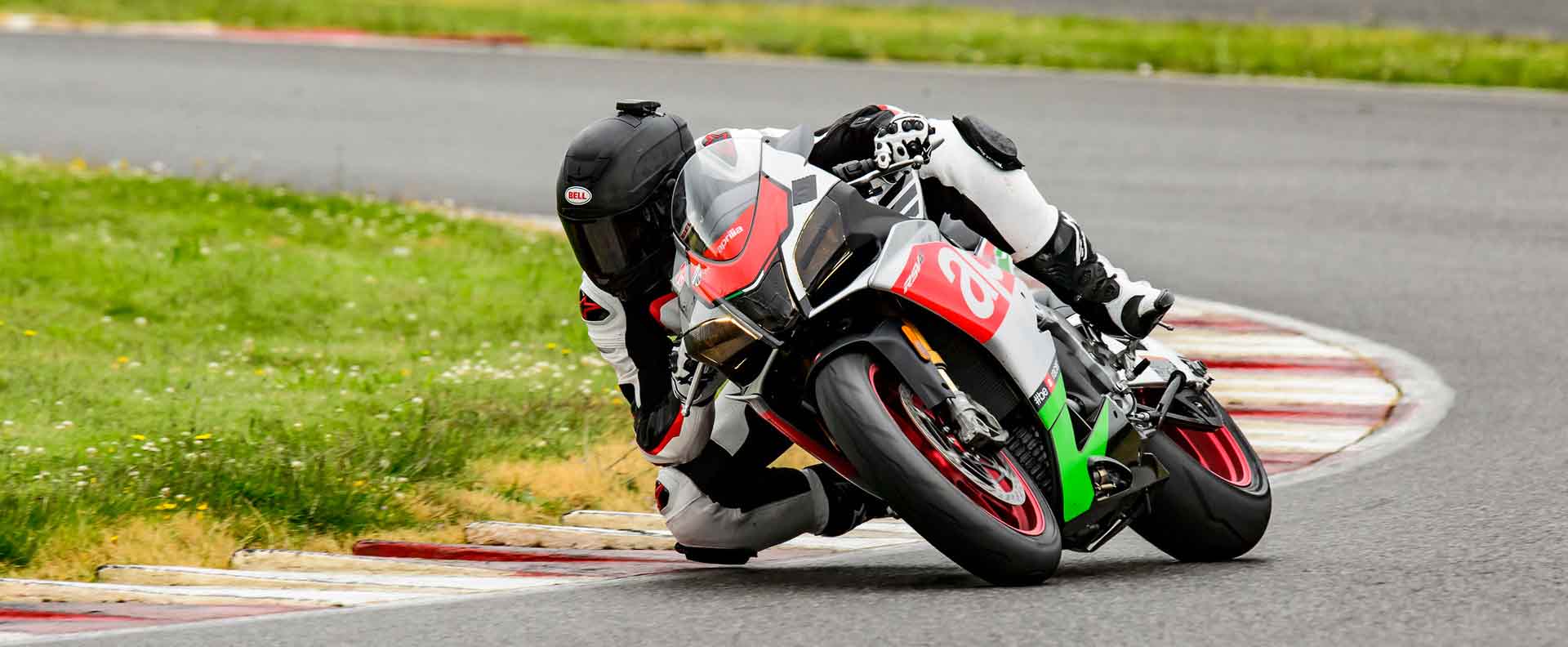 Andy riding an Aprilla in a test for Asphalt and Rubber of all new liter motorcycles at Portland International Raceway