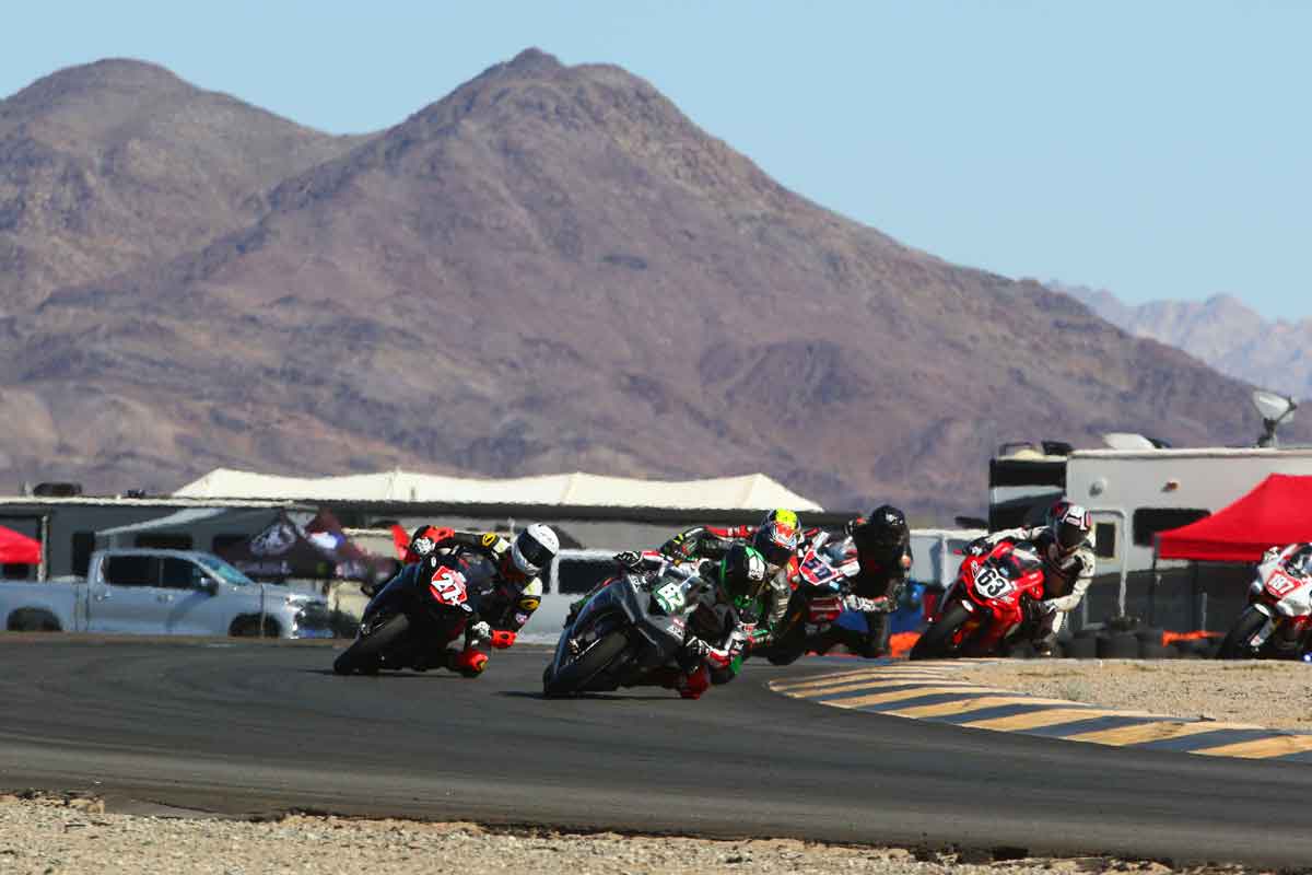 Andy DiBrino Chuckwalla Valley motorcycle association race leading pack during Saturday's Formula Open race, had a great 3-way battle with a couple fast MotoAmerica riders on their GSXR-1000 Superbikes.