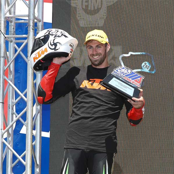 Andy DiBrino on the podium of first round of Super Hooligans winning 2nd in a tight finish after leading the whole race on his KTM 890 Duke R.