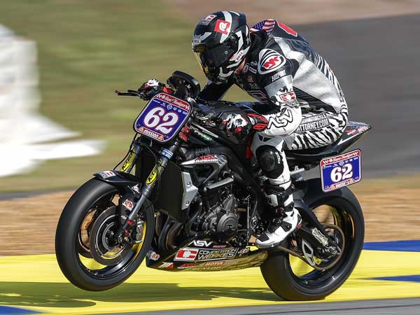 Andy DiBrino on his EDR Performance built Triumph Street Triple 765 RS doing a wheelie at race 2  super hooligan motorcycle race in Atlanta