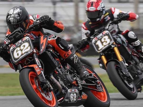Oregon's own Andy DiBrino Racing at Daytona Super Hooligans on his KTM 890R Duke in a battle with Cory West