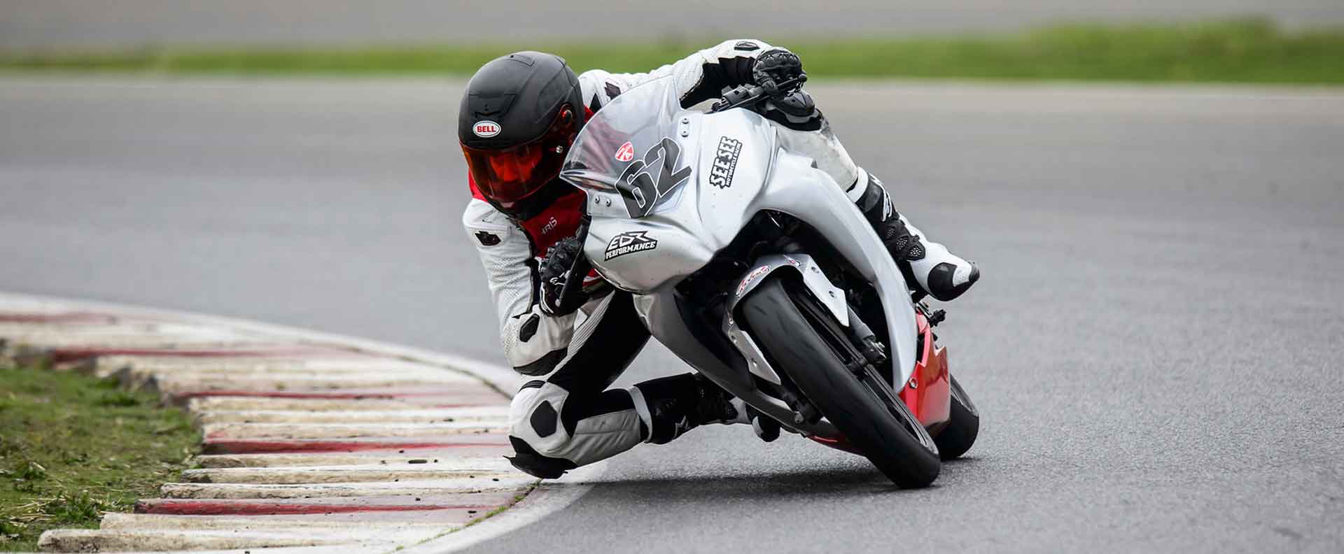 Andy riding riding at a moto Corsa track day as an instructor on his Ninja